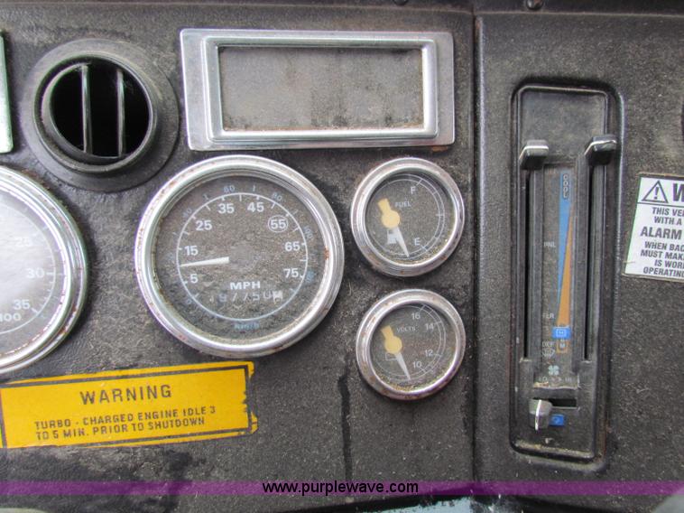 image for item B7129 1995 Ford LNT8000 tandem axle dump truck