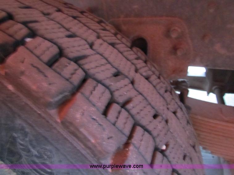 image for item B7129 1995 Ford LNT8000 tandem axle dump truck