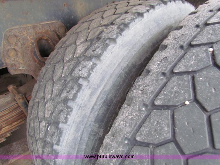 image for item B7129 1995 Ford LNT8000 tandem axle dump truck