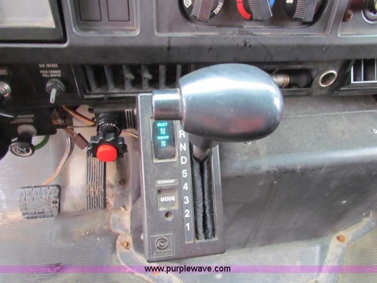 image for item B7130 1997 International 4900 tandem axle dump truck