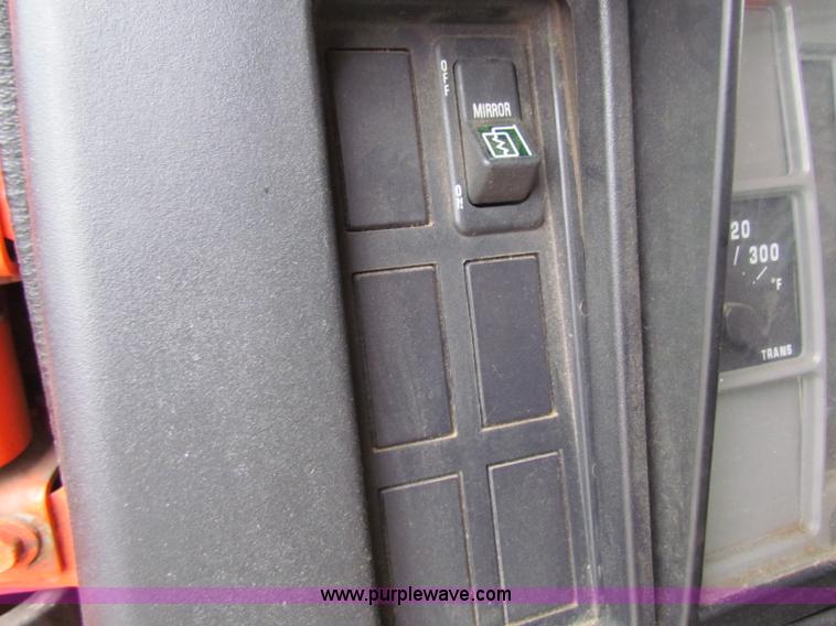 image for item B7130 1997 International 4900 tandem axle dump truck