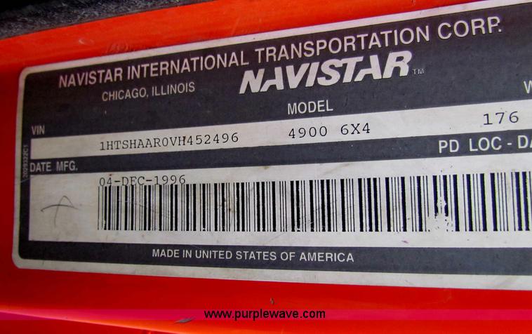 image for item B7130 1997 International 4900 tandem axle dump truck