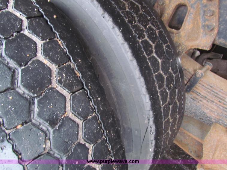 image for item B7130 1997 International 4900 tandem axle dump truck