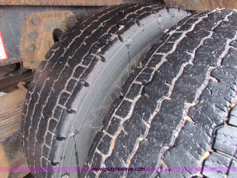 image for item B7130 1997 International 4900 tandem axle dump truck