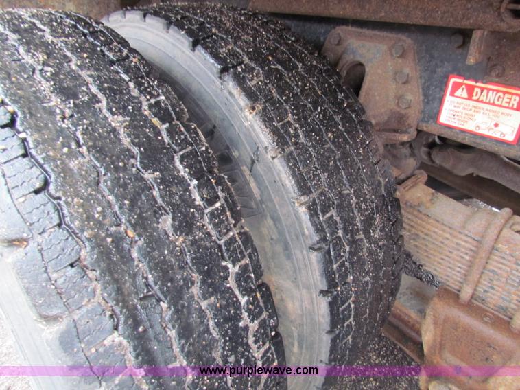 image for item B7130 1997 International 4900 tandem axle dump truck