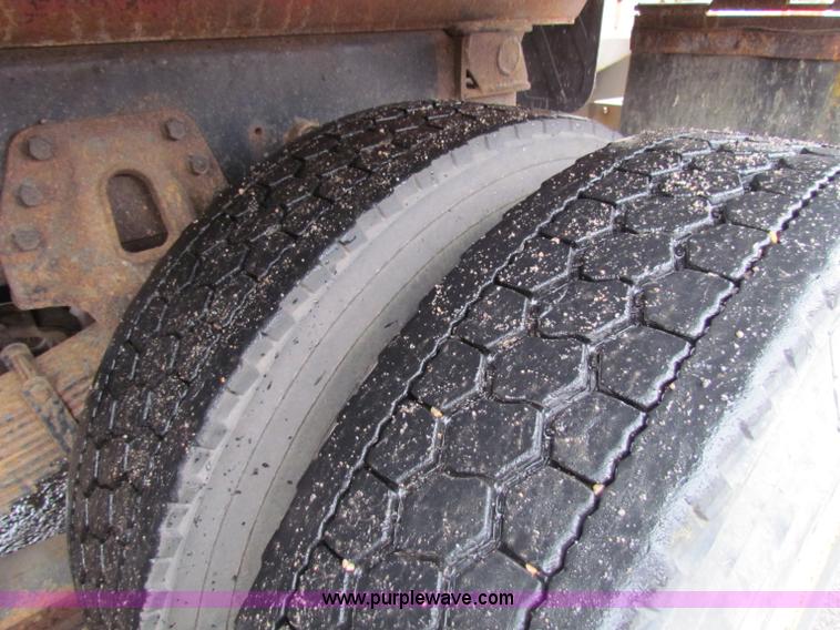 image for item B7130 1997 International 4900 tandem axle dump truck