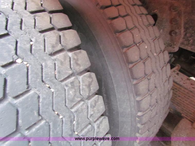 image for item B7133 1997 International 4900 tandem axle dump truck