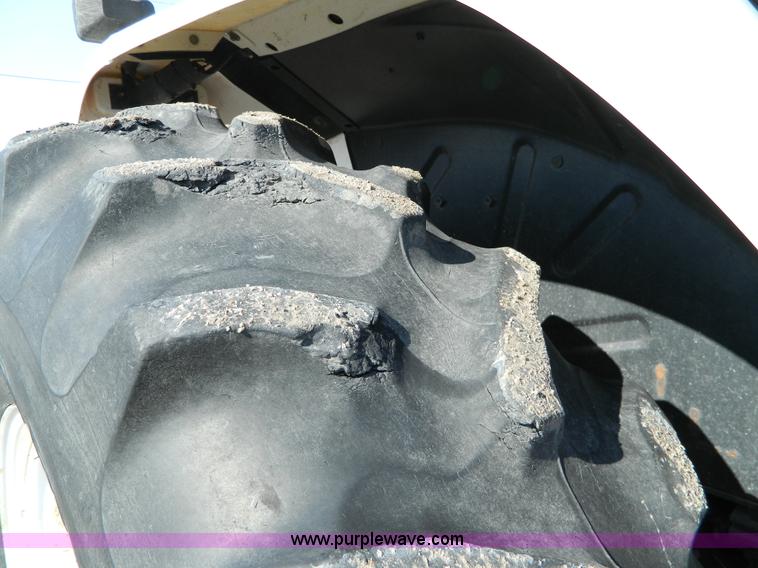 image for item D8781 1998 Ford New Holland 7740SL MFWD tractor