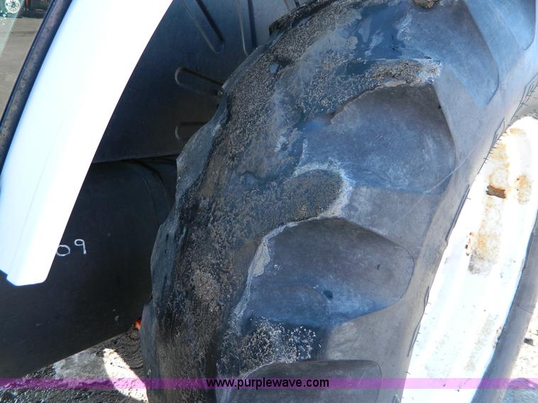 image for item D8781 1998 Ford New Holland 7740SL MFWD tractor