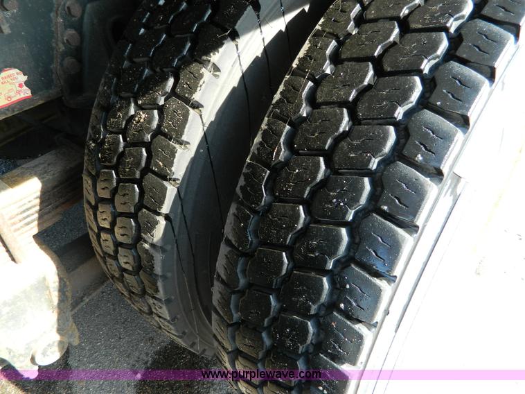 image for item D8785 1999 International 4900 tandem axle dump truck