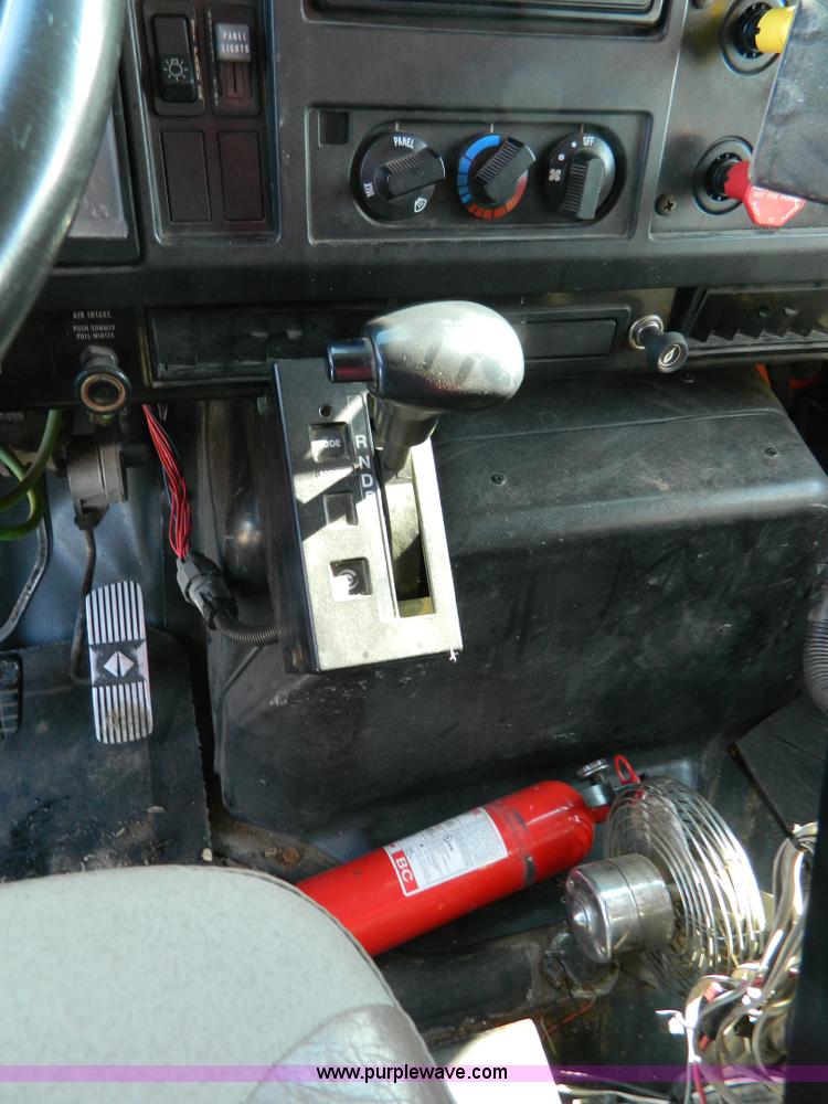 image for item D8785 1999 International 4900 tandem axle dump truck