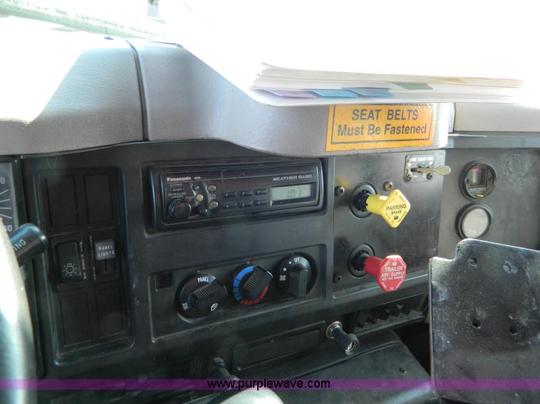 image for item D8785 1999 International 4900 tandem axle dump truck