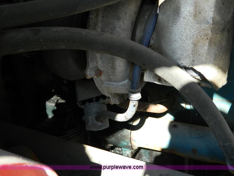 image for item D8785 1999 International 4900 tandem axle dump truck