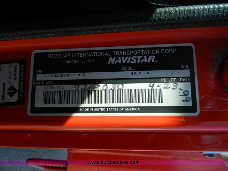 image for item D8789 1999 International 4900 tandem axle dump truck