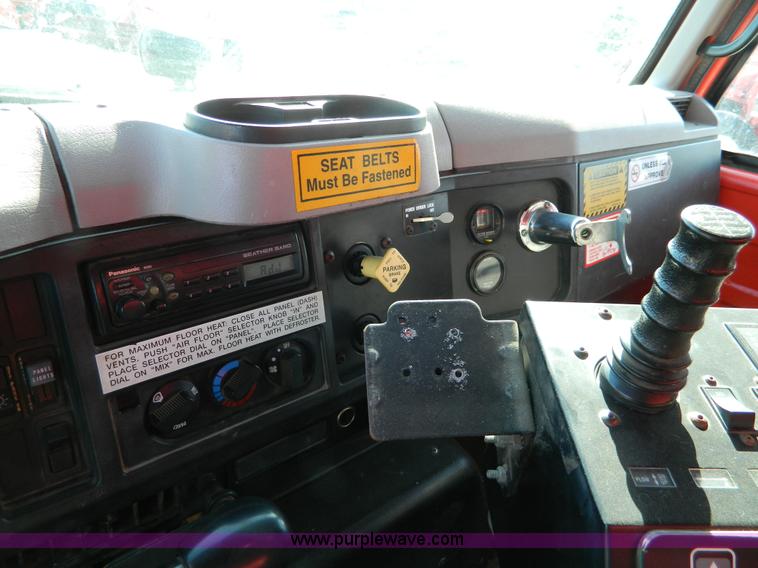 image for item D8789 1999 International 4900 tandem axle dump truck