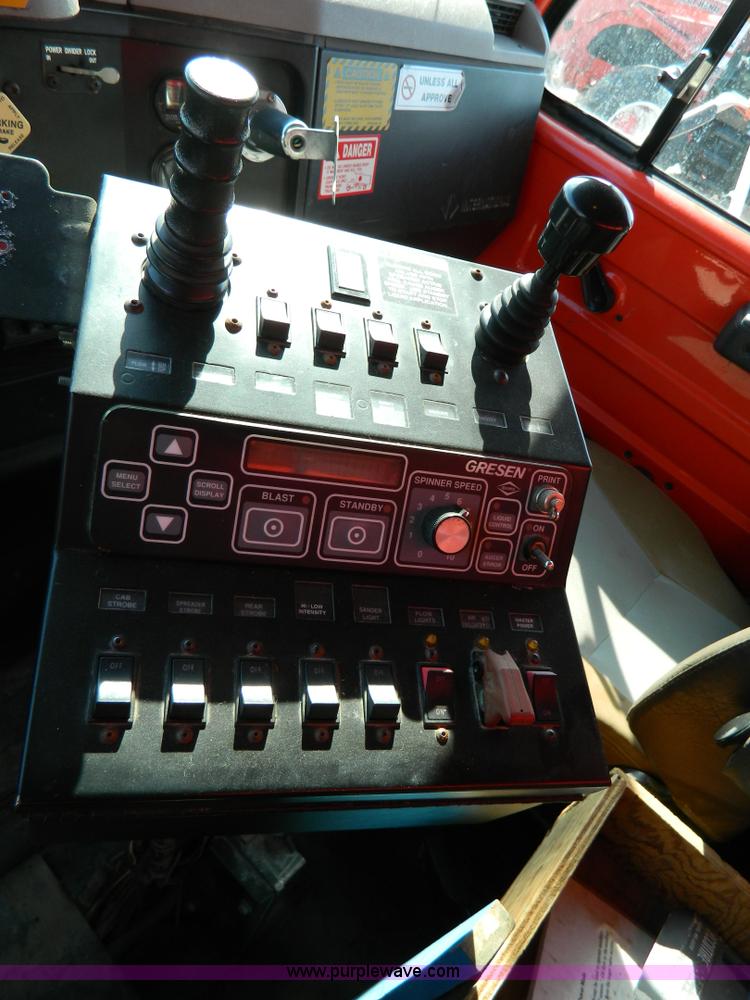 image for item D8789 1999 International 4900 tandem axle dump truck