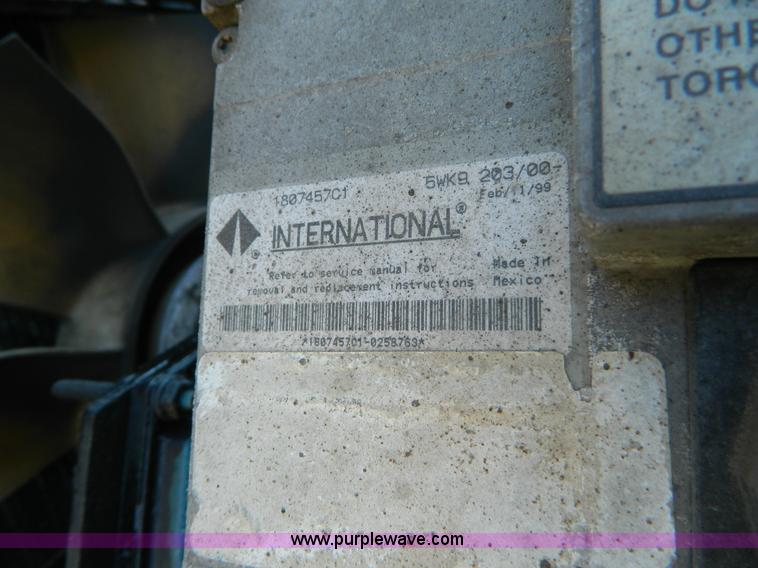 image for item D8789 1999 International 4900 tandem axle dump truck