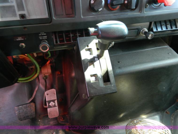 image for item D8792 1999 International 4900 tandem axle dump truck