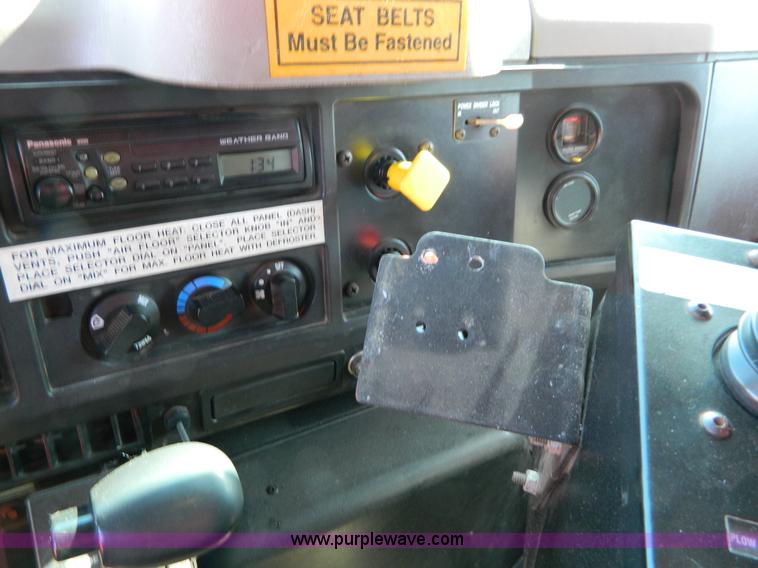 image for item D8792 1999 International 4900 tandem axle dump truck