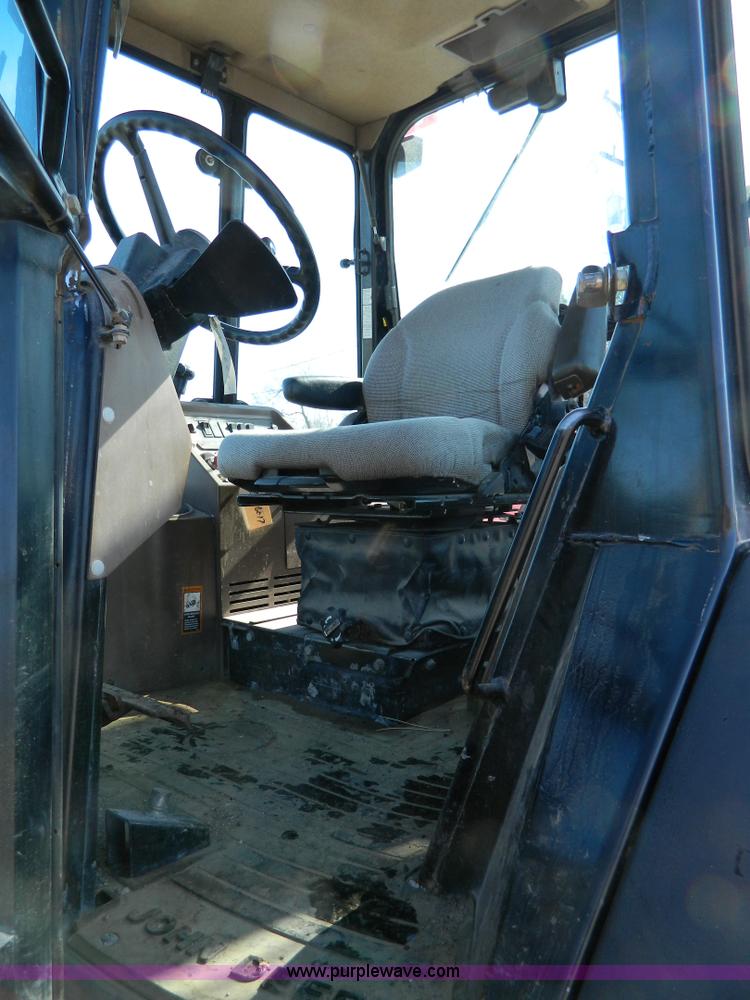 image for item D8806 1997 John Deere 310E backhoe