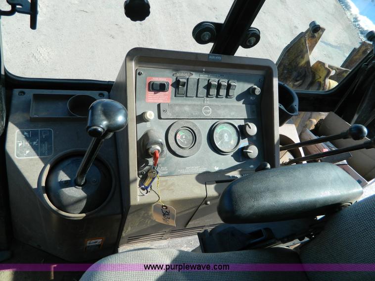 image for item D8806 1997 John Deere 310E backhoe