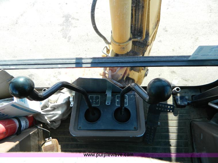 image for item D8806 1997 John Deere 310E backhoe