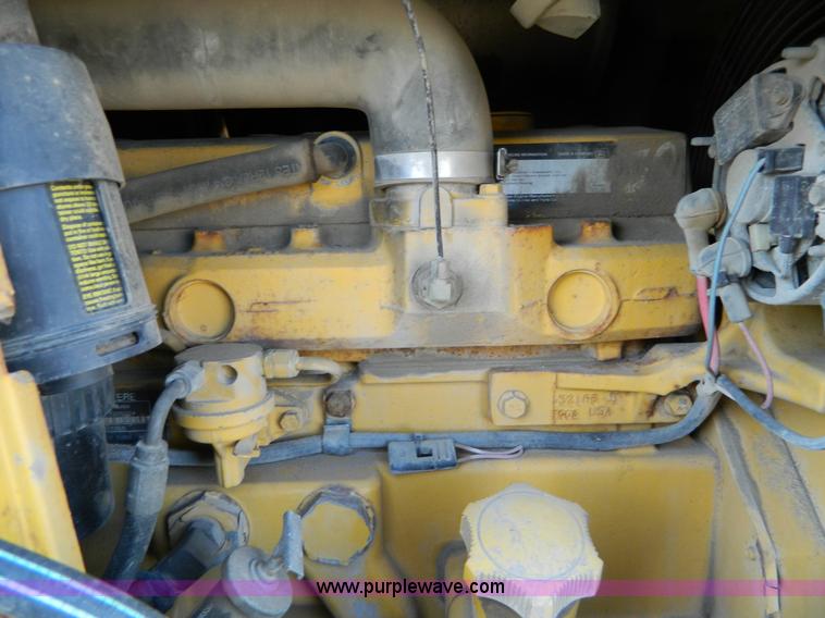 image for item D8806 1997 John Deere 310E backhoe