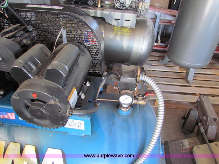 image for item I9574 2002 Puma TE5060H 60 gallon air compressor