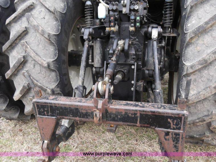 image for item B1010 2004 New Holland TM190 MFWD tractor