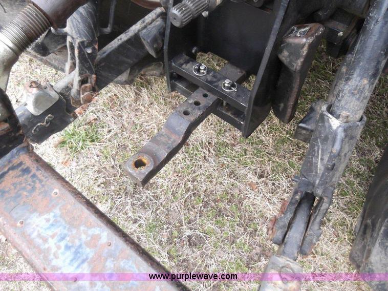 image for item B1010 2004 New Holland TM190 MFWD tractor