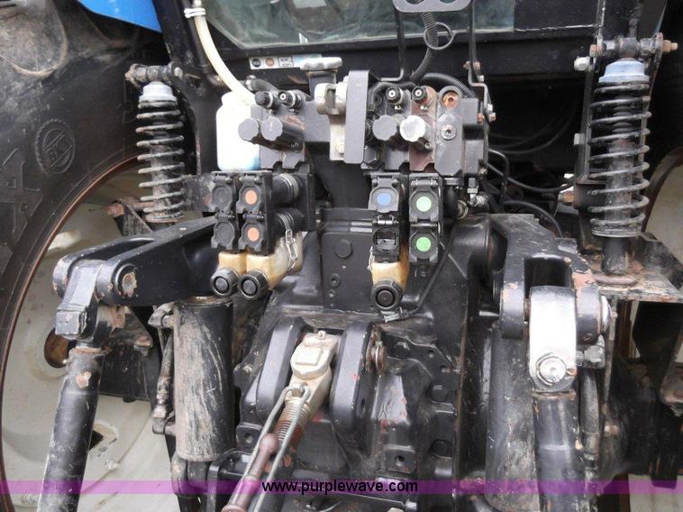 image for item B1010 2004 New Holland TM190 MFWD tractor