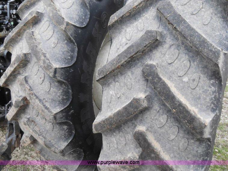 image for item B1010 2004 New Holland TM190 MFWD tractor