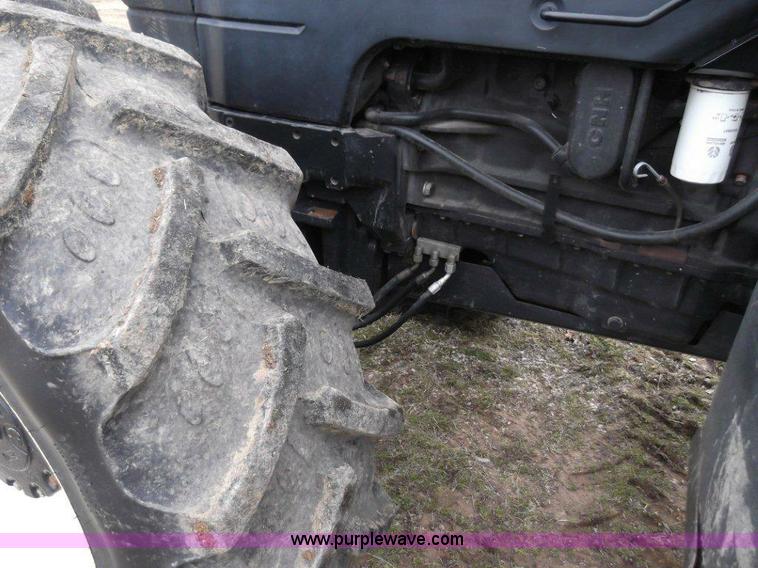 image for item B1010 2004 New Holland TM190 MFWD tractor