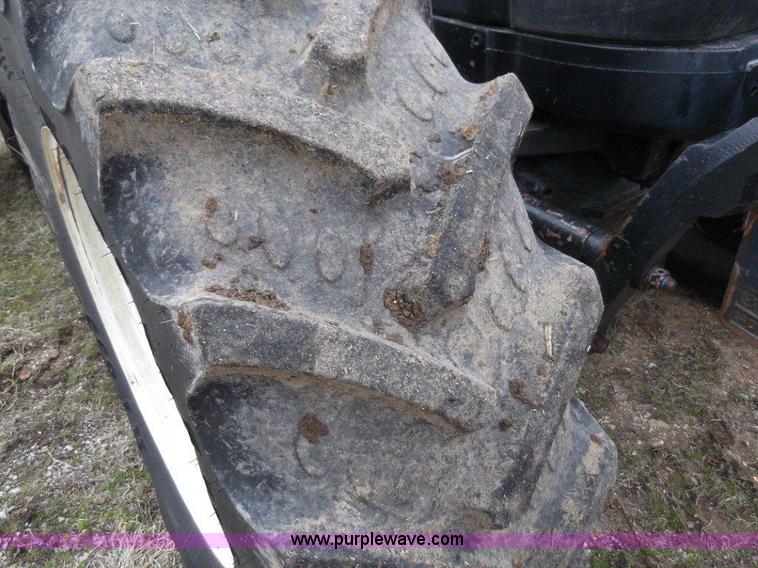 image for item B1010 2004 New Holland TM190 MFWD tractor