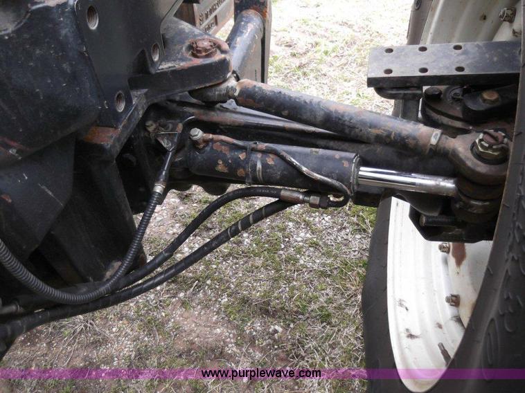 image for item B1010 2004 New Holland TM190 MFWD tractor