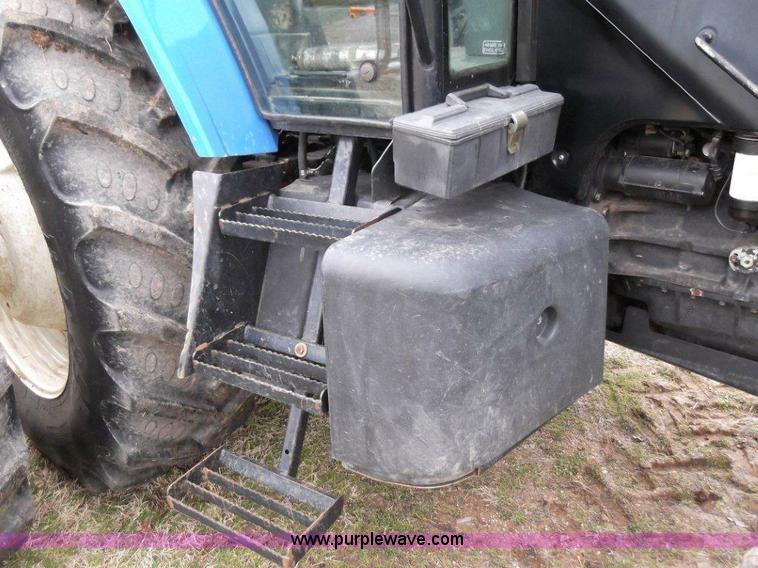 image for item B1010 2004 New Holland TM190 MFWD tractor