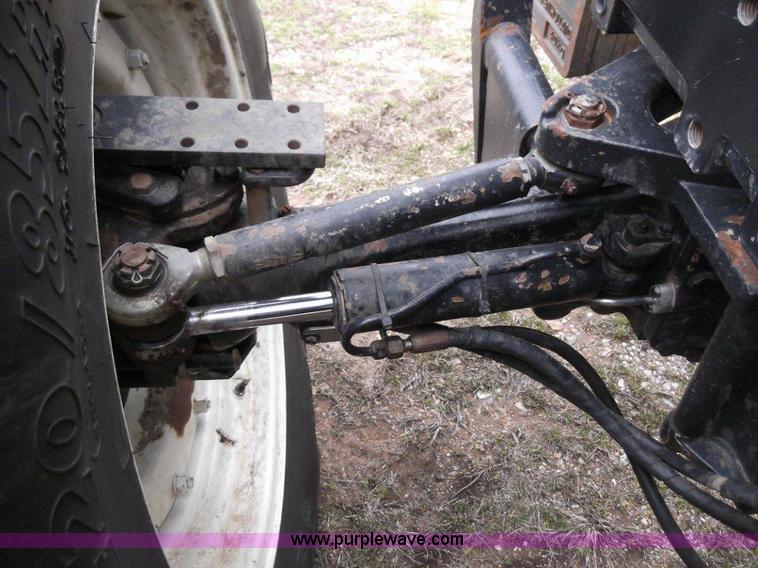 image for item B1010 2004 New Holland TM190 MFWD tractor