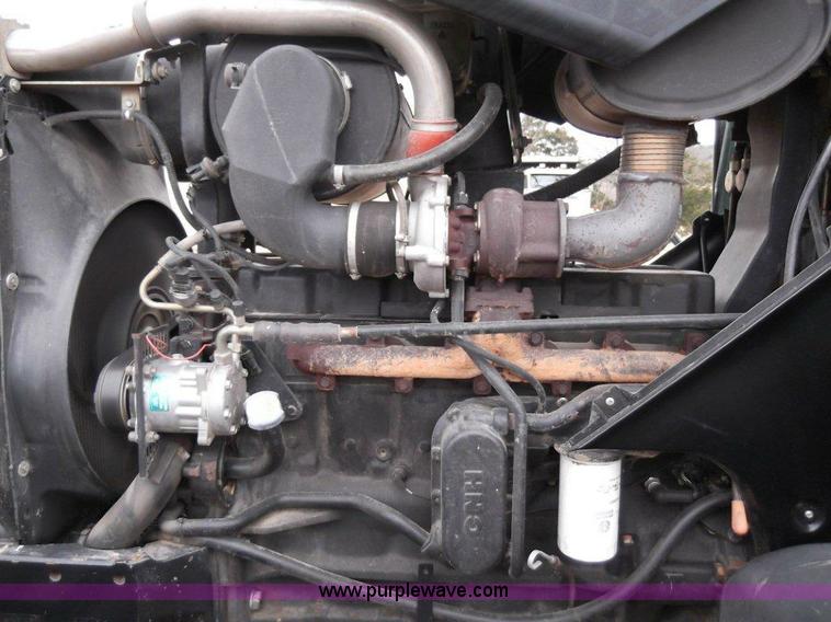 image for item B1010 2004 New Holland TM190 MFWD tractor