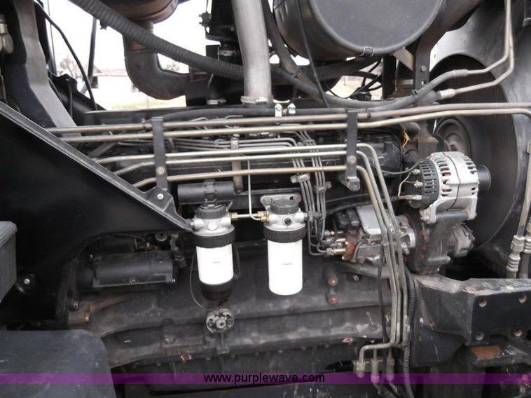 image for item B1010 2004 New Holland TM190 MFWD tractor