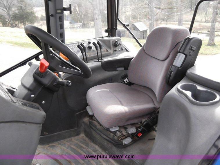 image for item B1010 2004 New Holland TM190 MFWD tractor