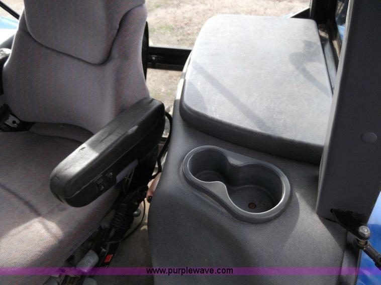 image for item B1010 2004 New Holland TM190 MFWD tractor