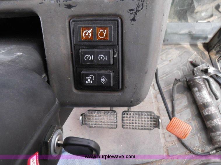 image for item B1010 2004 New Holland TM190 MFWD tractor