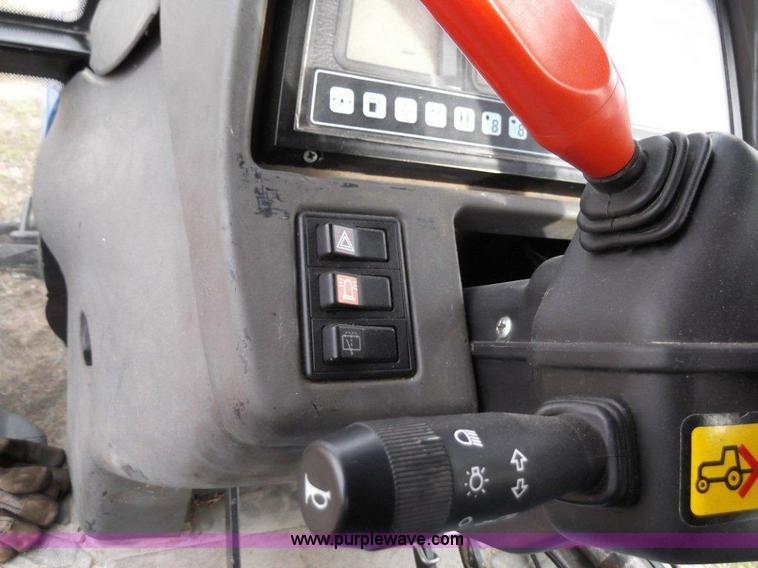 image for item B1010 2004 New Holland TM190 MFWD tractor