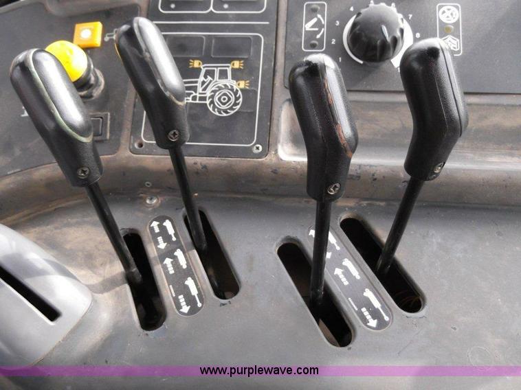 image for item B1010 2004 New Holland TM190 MFWD tractor