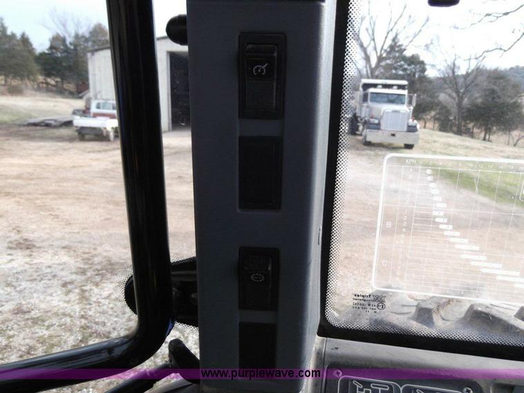 image for item B1010 2004 New Holland TM190 MFWD tractor