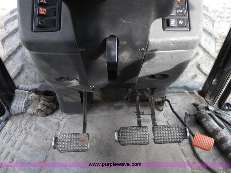 image for item B1010 2004 New Holland TM190 MFWD tractor