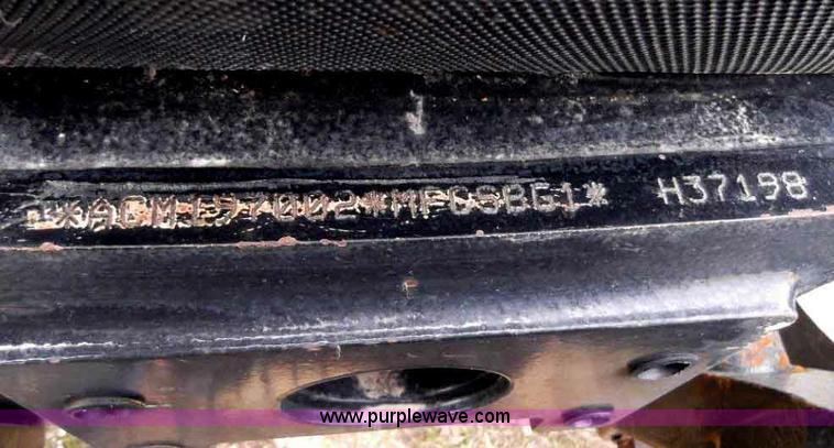 image for item B1010 2004 New Holland TM190 MFWD tractor