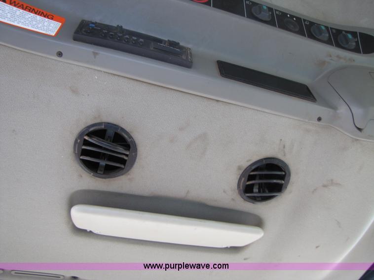 image for item B2209 1998 Caterpillar 480 Lexion combine