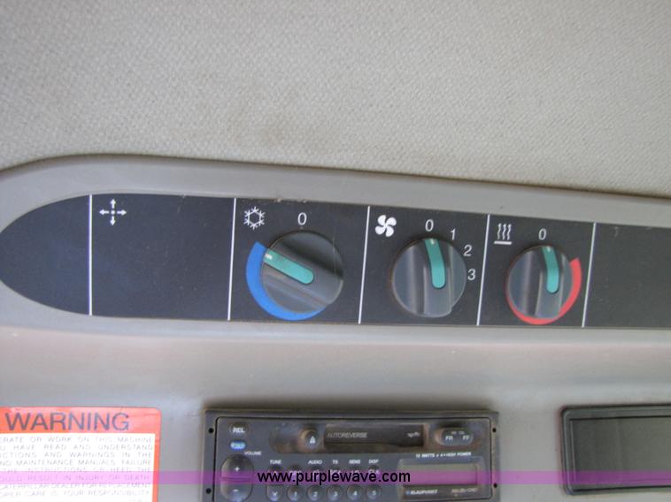 image for item B2209 1998 Caterpillar 480 Lexion combine