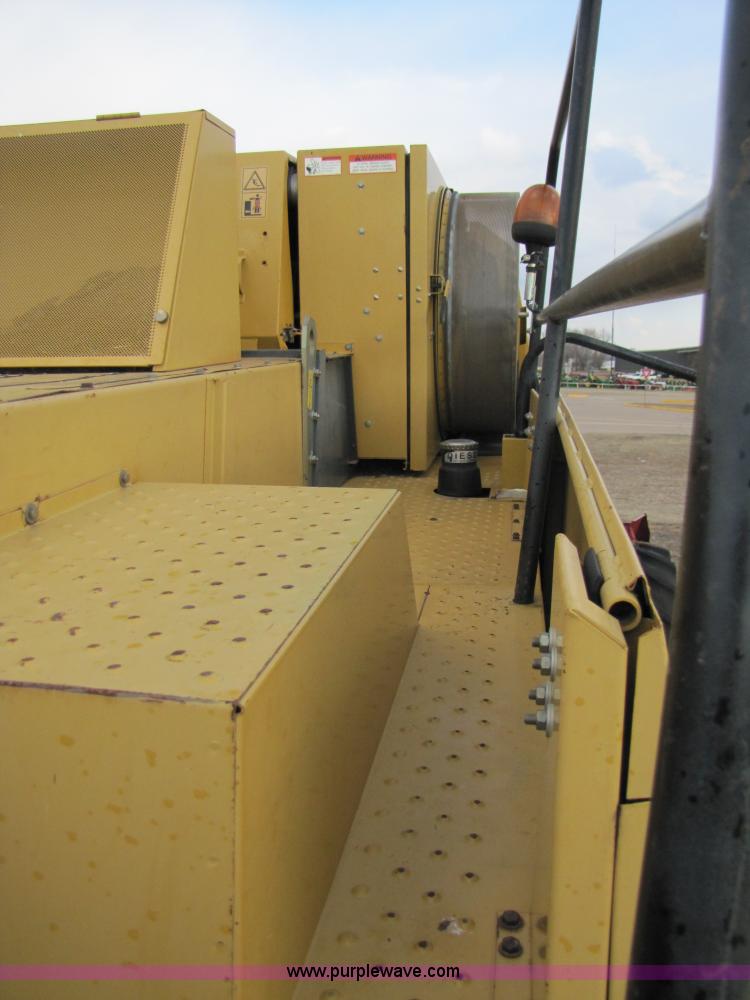 image for item B2209 1998 Caterpillar 480 Lexion combine
